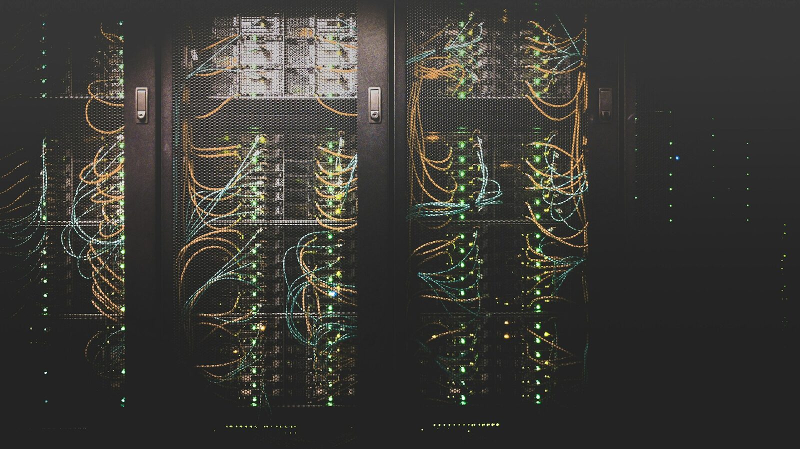 Server racks and network infrastructure in a data centre, representing hosting operations